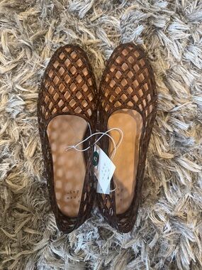 A. New Day Brown Jelly Flats in size 9